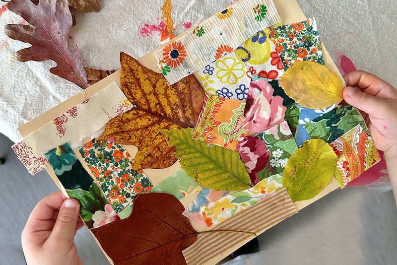 Children make mixed media collage with leaves, fabric scraps, and